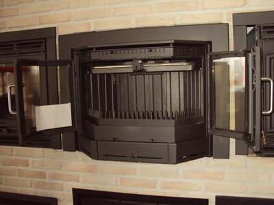 Show-room Ets. Duvivier SA à Rochefort (chauffage, poêlerie, sanitaire, énergies renouvelables), Puissance : 9 kW - 180 m³