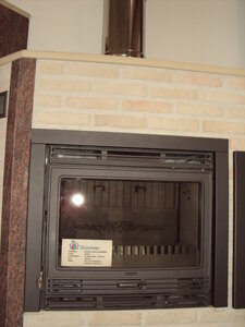 Show-room Ets. Duvivier SA à Rochefort (chauffage, poêlerie, sanitaire, énergies renouvelables), Puissance : 12 kW - 240 m³