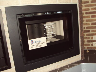 Show-room Ets. Duvivier SA à Rochefort (chauffage, poêlerie, sanitaire, énergies renouvelables), Puissance : 11,5 kW - 230 m³